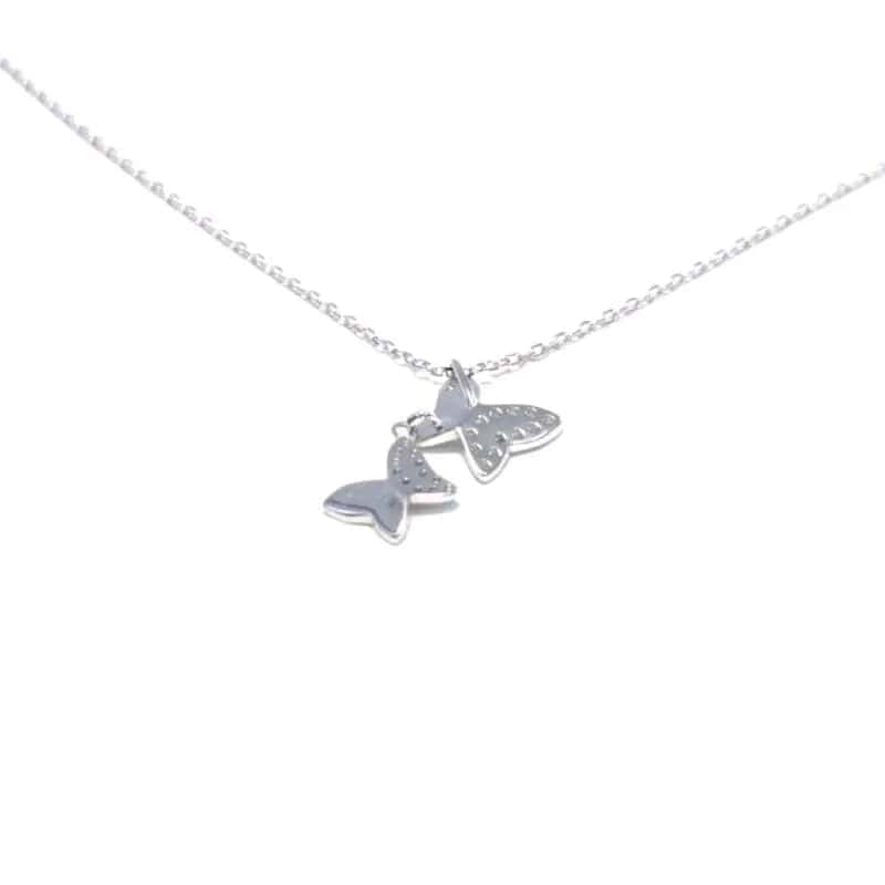 Silver butterfly pendant necklace with white stones